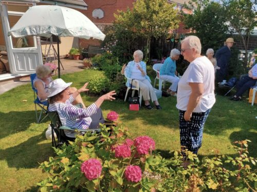 Book club social distancing in the garden in Seaham